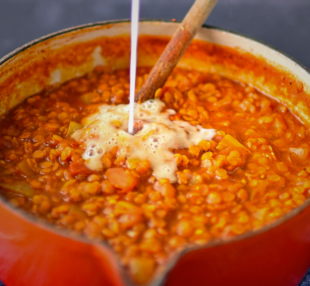 Cooking the lentils in a pot for the Dhal Recipe